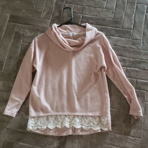 Pink sweater with lace trim at waist for girls